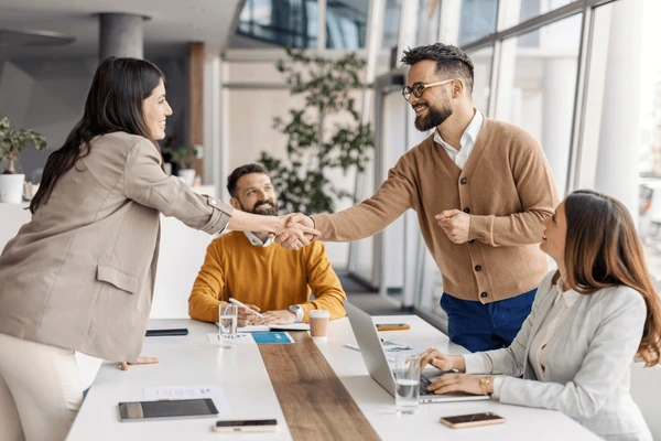 Business professionals forming a partner relationship